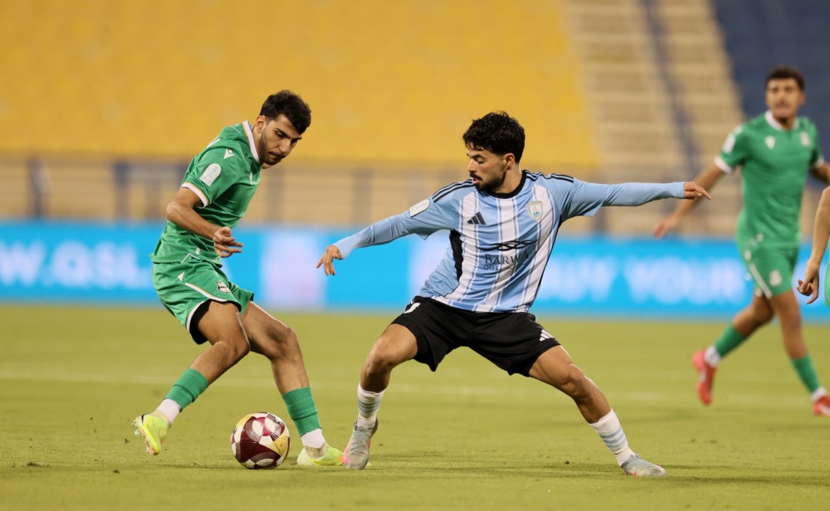 Action during the match between Al Ahli and Al Wakrah.