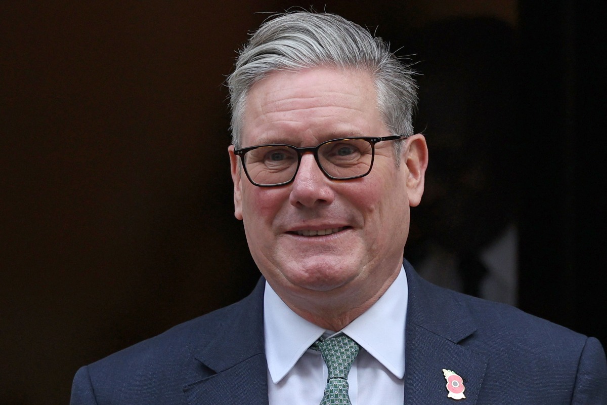 Britain's Prime Minister Keir Starmer leaves 10 Downing Street in central London on November 12, 2025, to take part in the weekly session of Prime Minister's Questions (PMQs). (Photo by Adrian Dennis / AFP)