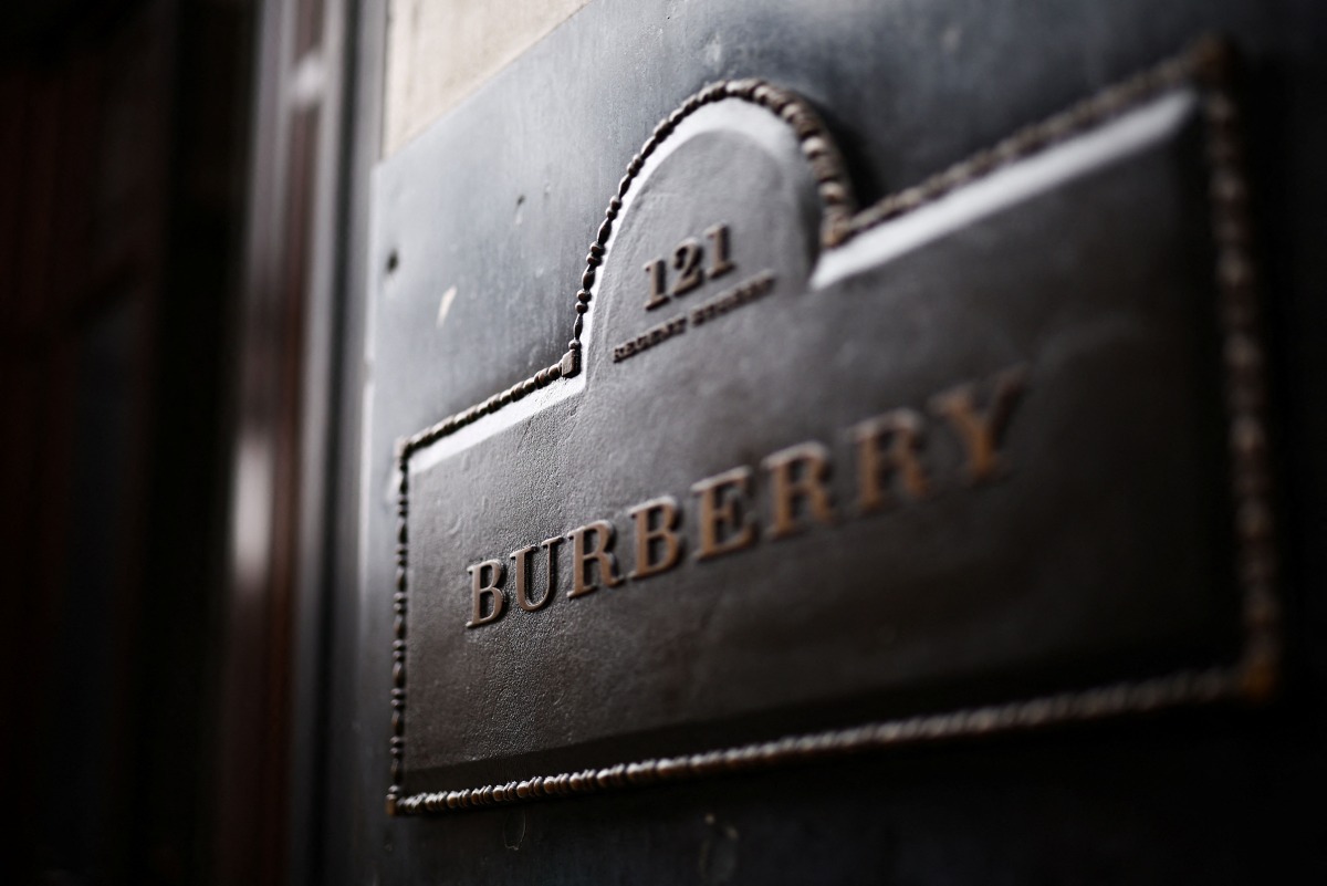 This photograph taken on September 2, 2024 shows the entrance plaque of the British fashion label Burberry outside the store in central London. Photo by HENRY NICHOLLS / AFP