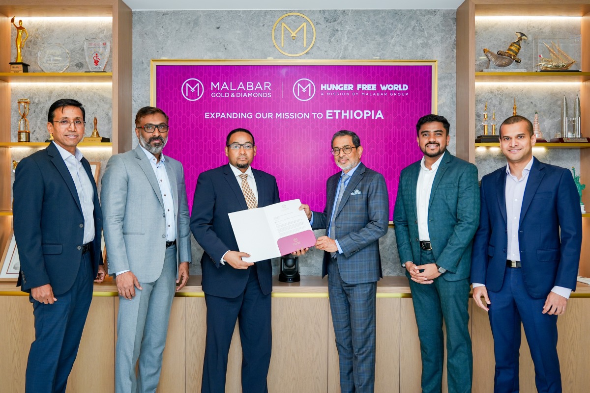 Vice Chairman of Malabar Group, Abdul Salam K.P, handing over the Letter of Intent to Consul General of Ethiopia in Dubai, H E Asmelash Bekele in the presence of other officials.