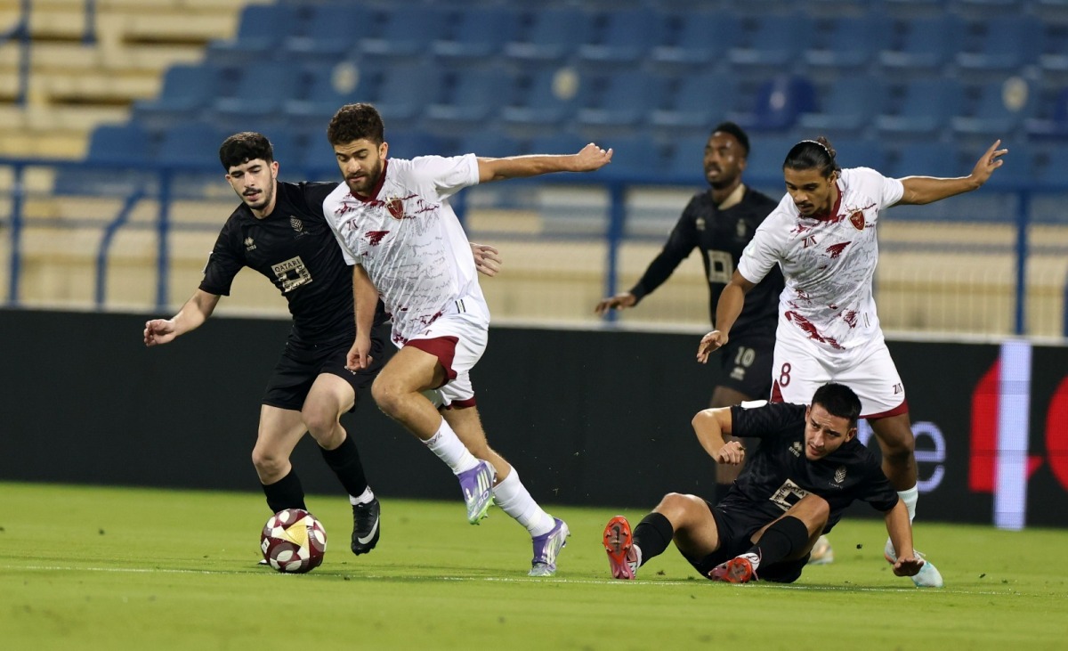 Action during the match between Al Markhiya and Lusail yesterday. 
