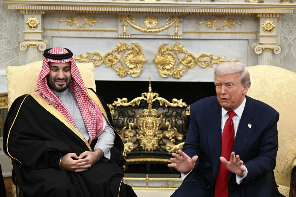 US President Donald Trump meets with Crown Prince and Prime Minister of the Kingdom of Saudi Arabia Mohammed bin Salman in the Oval Office of the White House in Washington, DC on November 18, 2025. Photo by Brendan Smialowski / AFP