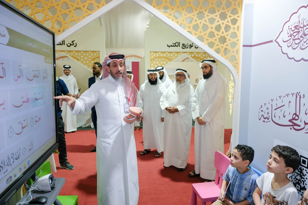 Minister of Awqaf and Islamic Affairs H E Ghanem bin Shaheen Al Ghanem with other officials touring an associated exhibition of the 30th edition of the Sheikh Jassim bin Mohammed bin Thani Quran Competition at Imam Muhammad bin Abd Al-Wahhab Mosque. 