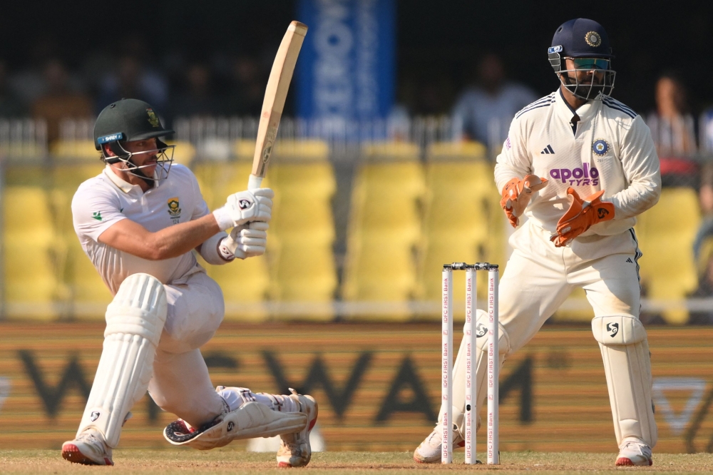 South Africa's Tristan Stubbs plays a shot during the fourth day of the second Test cricket match between India and South Africa at the Barsapara Cricket Stadium in Guwahati on November 25, 2025. (Photo by Biju Boro / AFP) 
