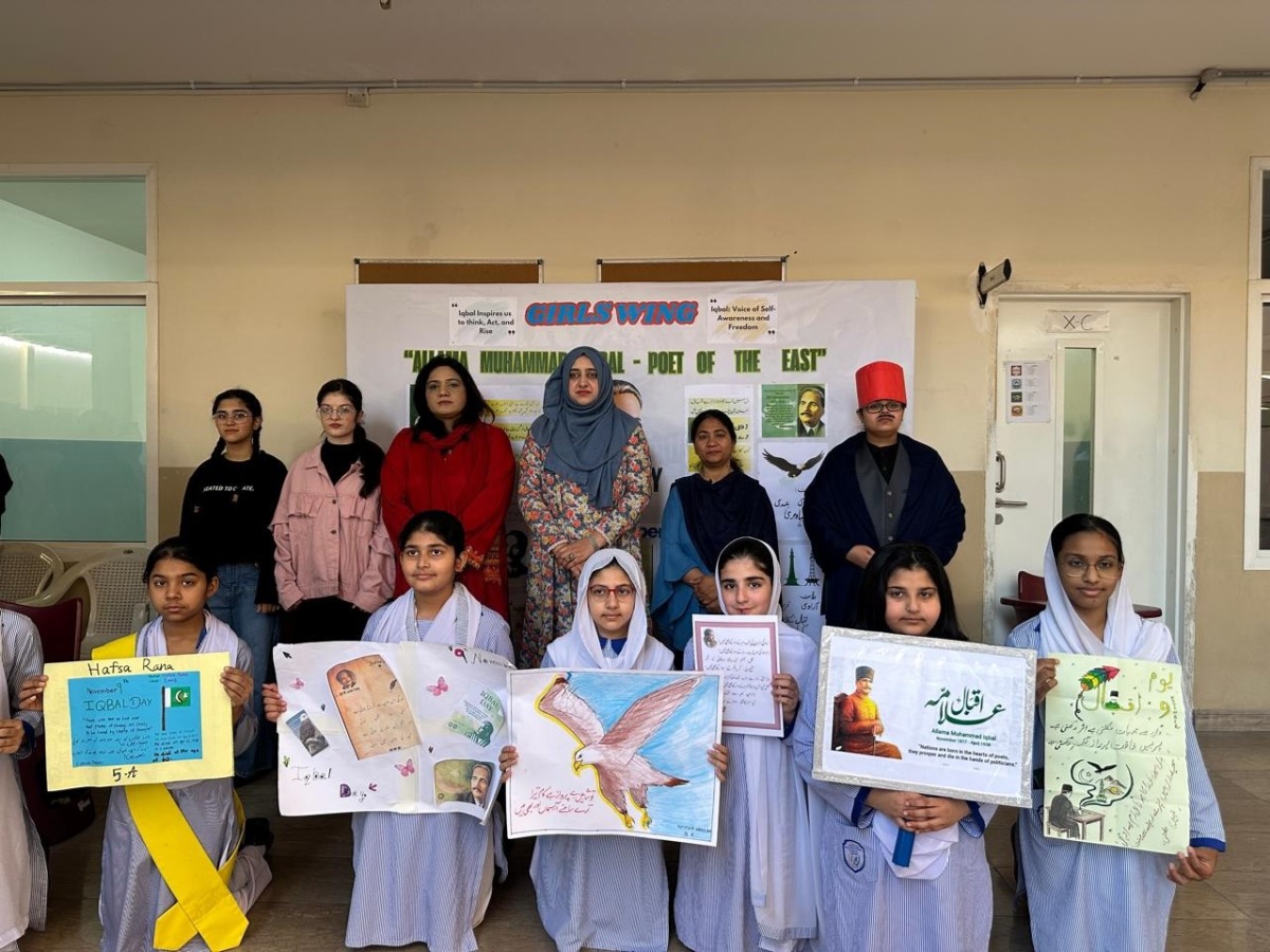 Officials with students during the event.