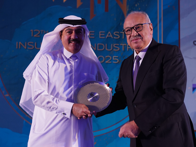 QIIG Group President, Ali Ibrahim Al-Abdulghani receiving the award.