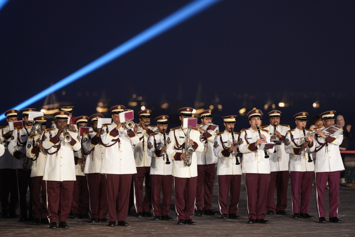 A Qatari band performs as part of the FIFA Arab Cub festivities at Katara.
