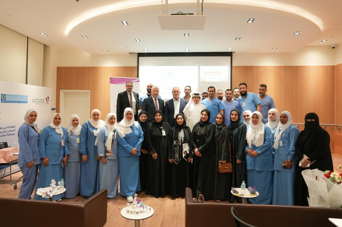 Officials with the participants at the workshop.