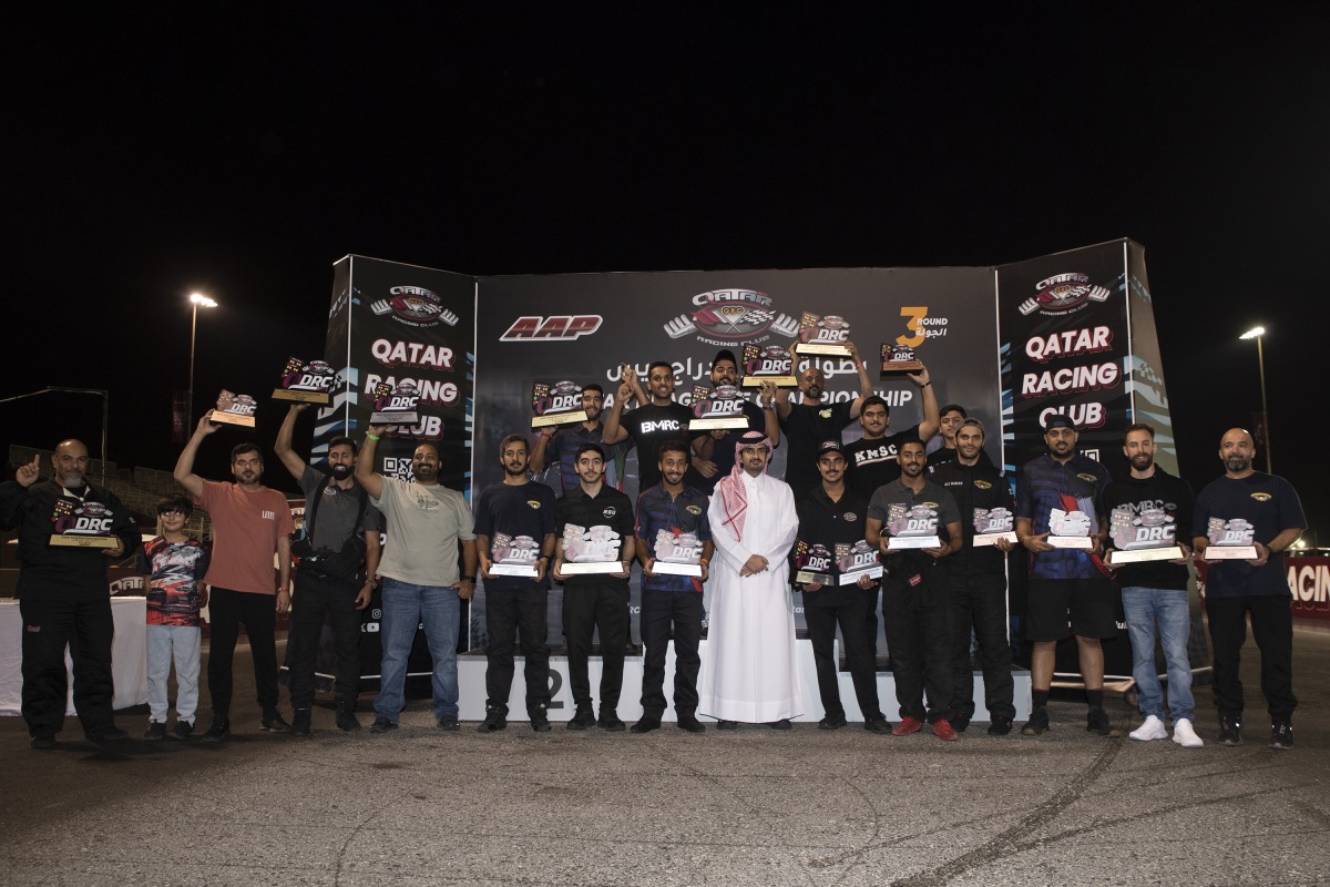 QRC Director General Sheikh Jabor bin Khalid Al Thani poses for a photo with the podium winners.