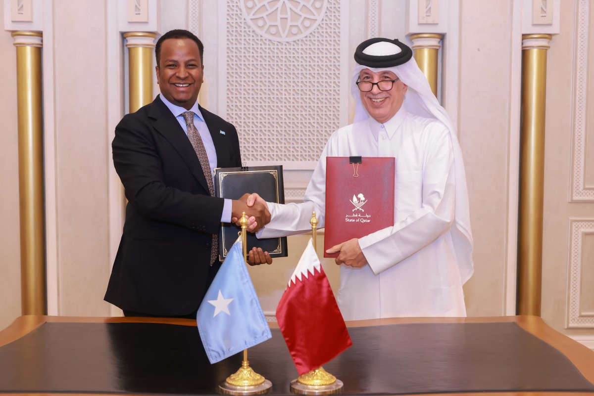 Minister of State for Foreign Affairs H E Sultan bin Saad Al Muraikhi and Somali Minister of Foreign Affairs and International Cooperation H E Abdisalam Abdi Ali exchange documents.
