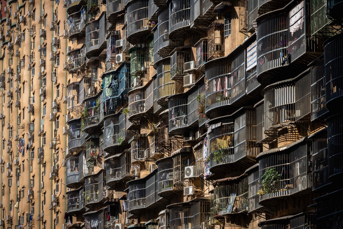 The Hou Kong residential building is seen in Macau on December 8, 2025. Macau's population is estimated around 710,000 across roughly 33 square kilometres, making it the world's most densely populated region. (Photo by Eduardo Leal / AFP)