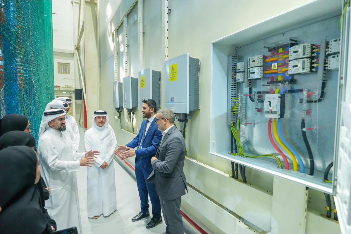 Officials during the visit to Al Taadhod Trading and Contracting Group building in Birkat Al Awamer area.