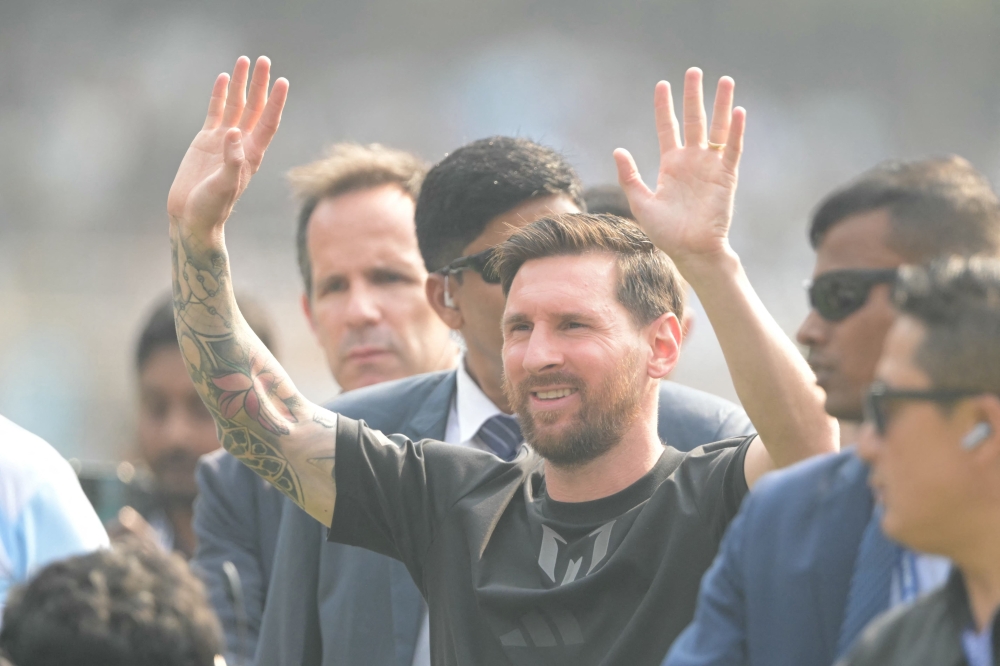 Inter Miami's Argentine forward #10 Lionel Messi arrives at the Salt Lake Stadium in Kolkata on December 13, 2025. (Photo by Dibyangshu Sarkar / AFP)