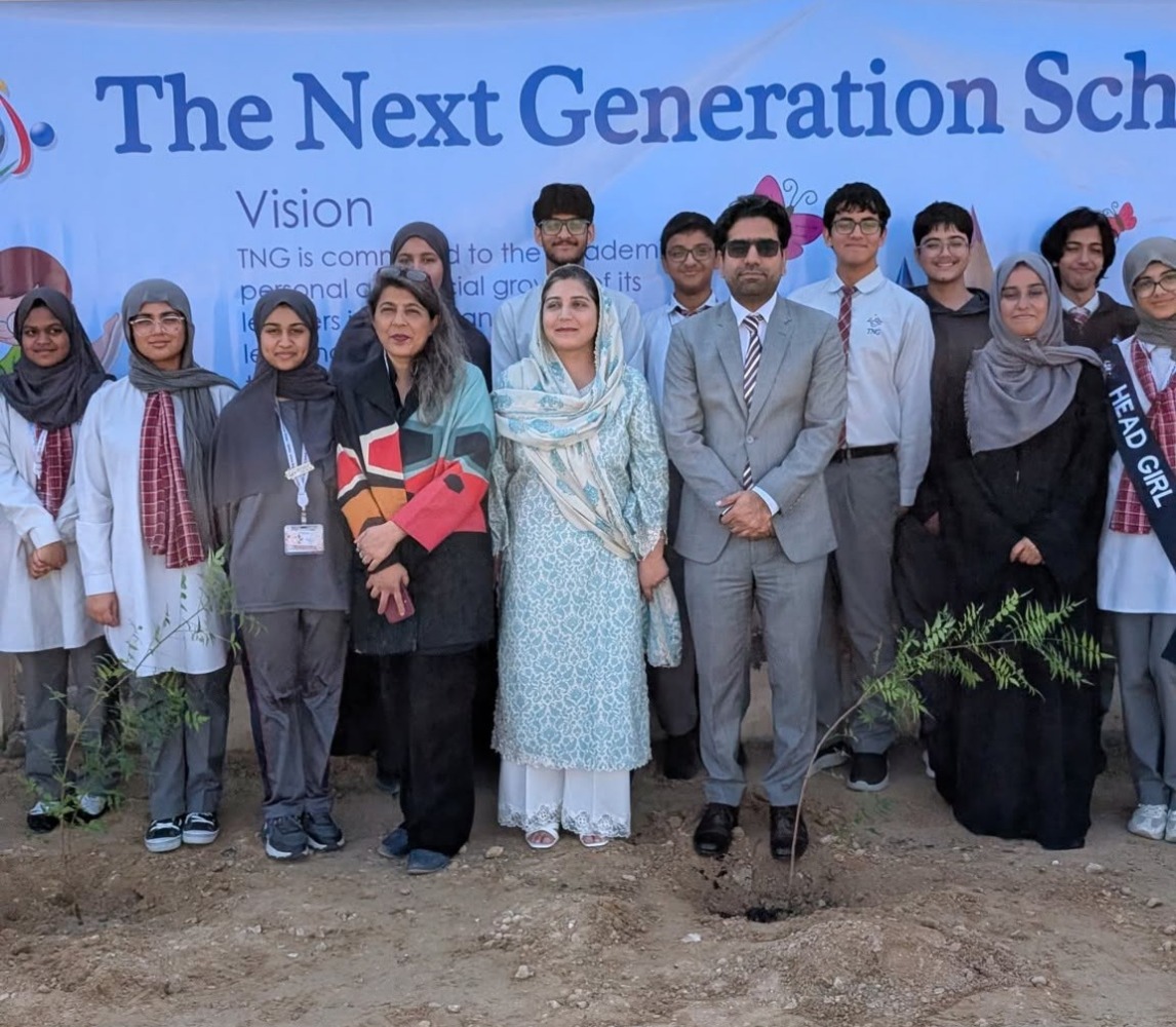 Pakistan Embassy and TNG officials with students during the visit.