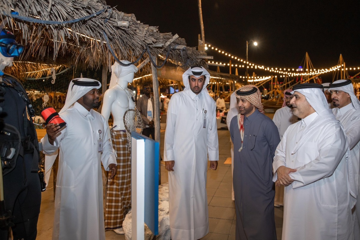 Minister of Environment and Climate Change H E Dr. Abdullah bin Abdulaziz bin Turki Al-Subaie and General Manager of the Katara Cultural Village Foundation Professor Dr. Khalid bin Ibrahim Al-Sulaiti visiting the festival.