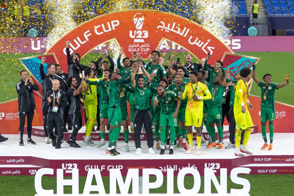 Saudi Arabia players and officials celebrate after winning the AGCFF U-23 Gulf Cup Qatar 2025 title yesterday.