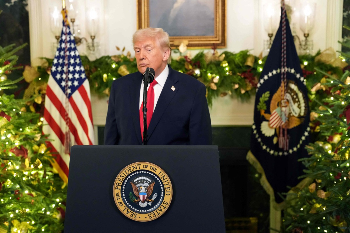 US President Donald Trump addresses the nation from the Diplomatic Reception Room of the White House in Washington, DC, on December 17, 2025. Photo by Doug MILLS / POOL / AFP