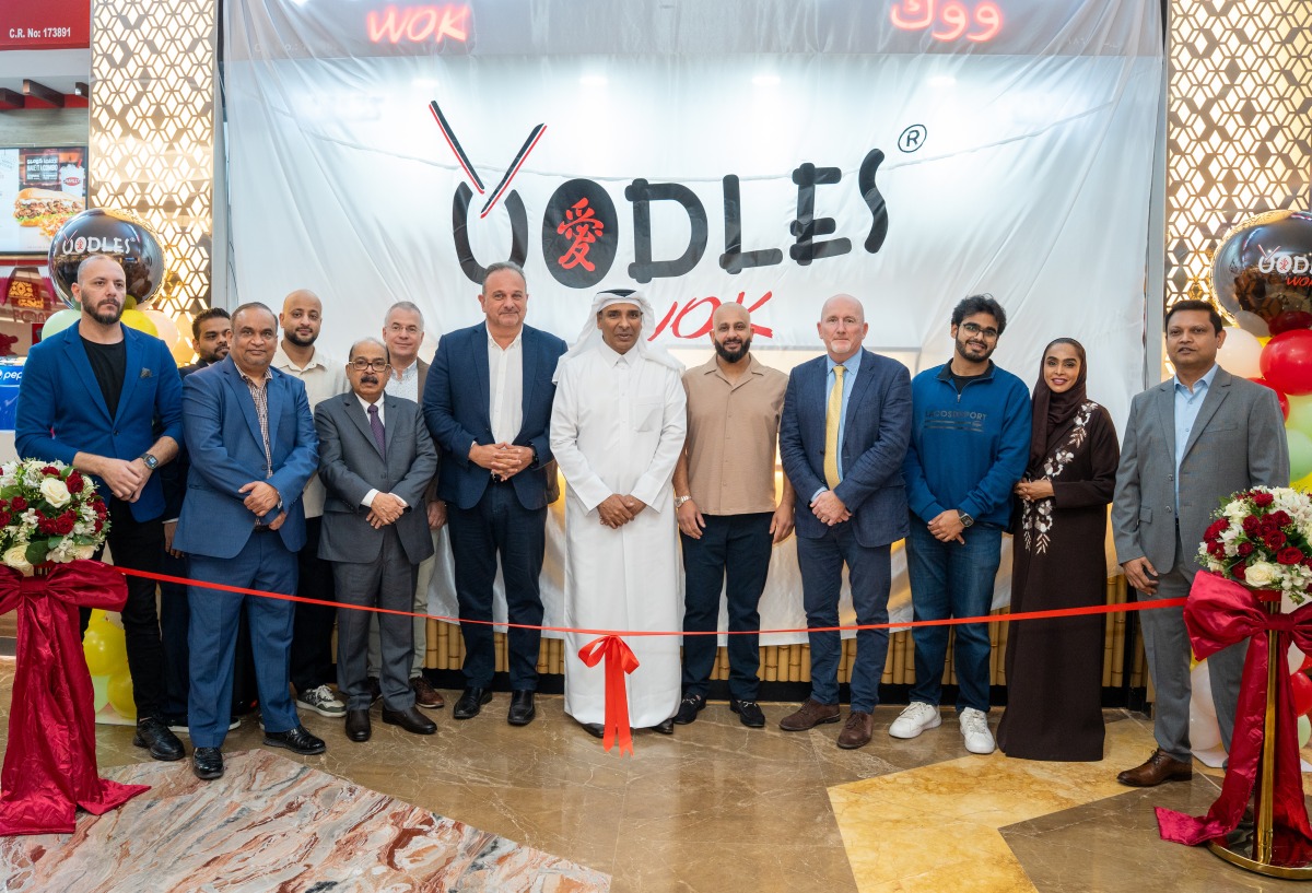 Officials and guests during the opening of Oodles Wok outlet at City Centre Doha Mall.