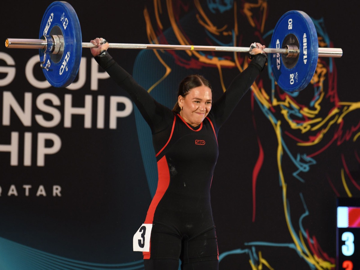 Qatari weightlifter Sarah Al-Qubaisi competes during the women’s 77 kg category event.