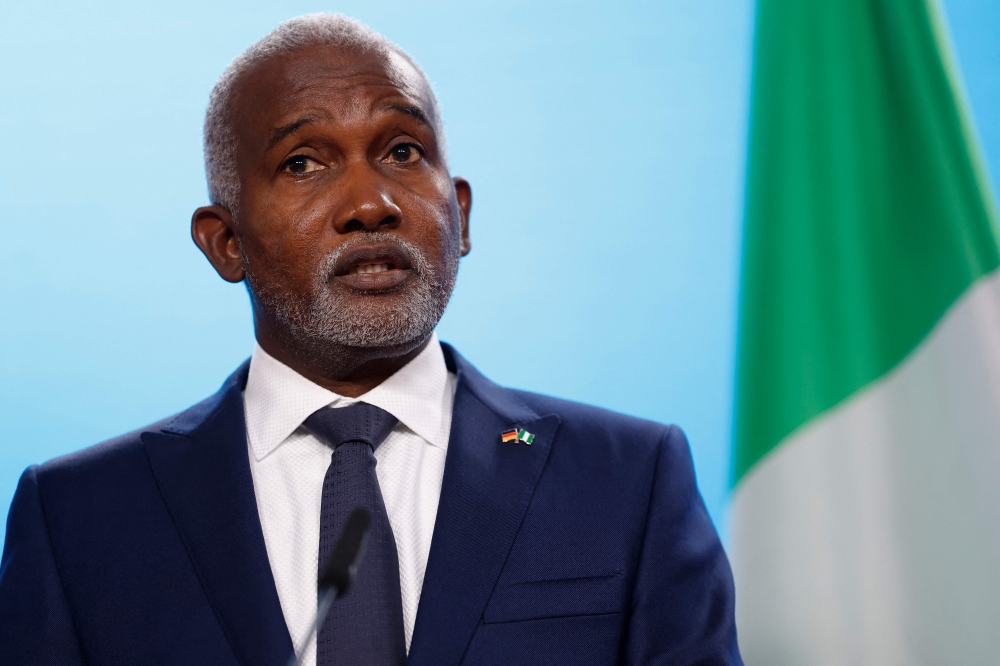 (Files) Nigerian Foreign Minister Yusuf Tuggar speaks during a press conference on November 4, 2025 at the Foreign Office in Berlin, Germany. (Photo by Odd Andersen / AFP)