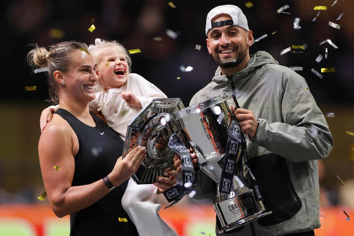 Aryna Sabalenka celebrates with Nick Kyrgios after their match.