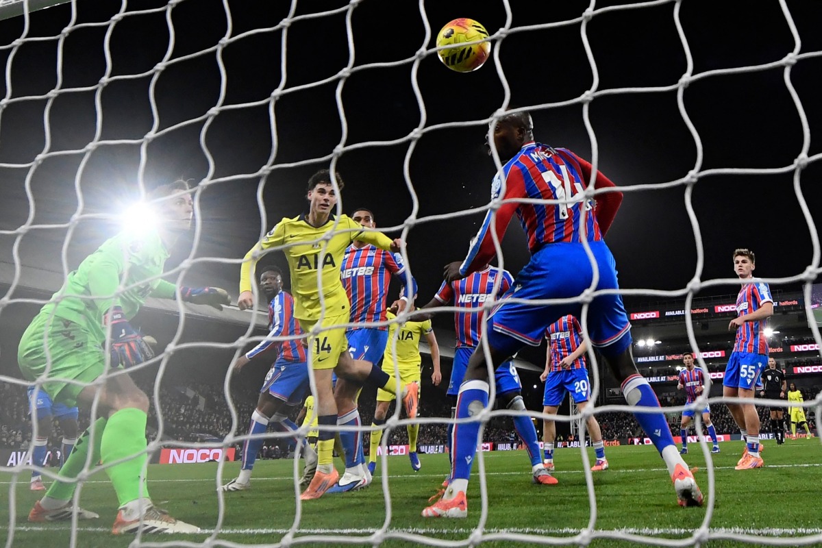 Tottenham's  Archie Gray (centre) heads in the opening goal against Crystal Palace. 