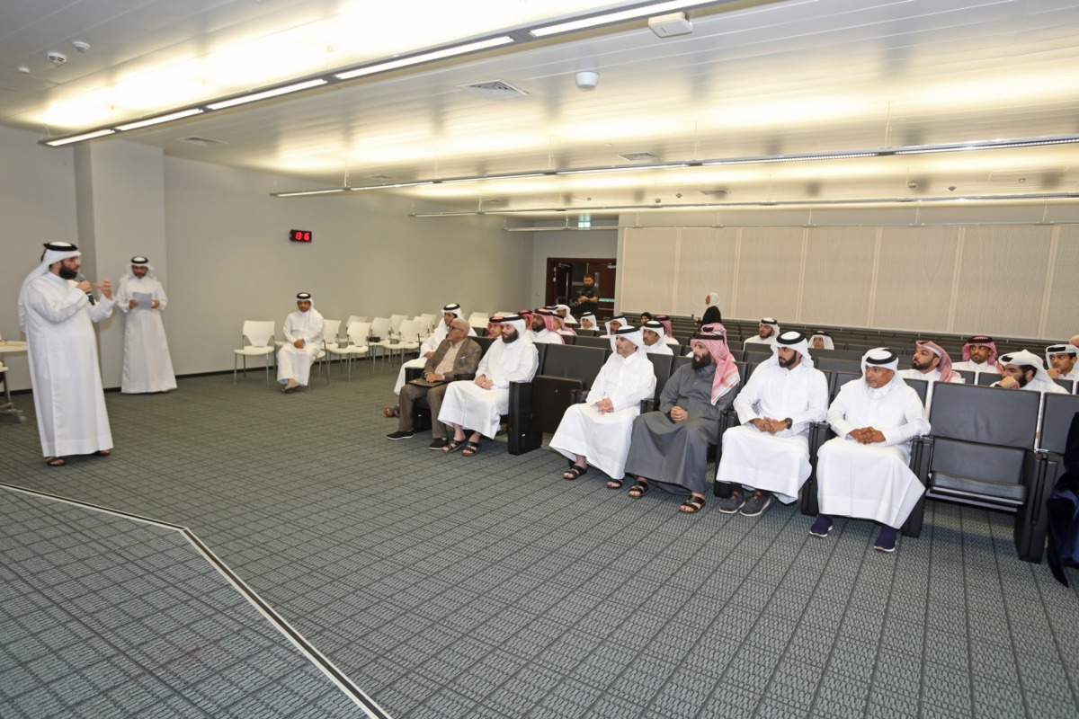 Officials from the Ministry of Awqaf and Islamic Affairs and the Ministry of Education and Higher Education, and selected students attend a briefing on the Umrah programme. 