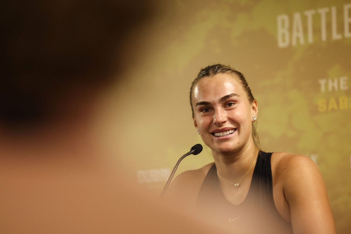 Belarus' Aryna Sabalenka speaks during a news conference in Dubai on December 28, 2025. (Photo by Amr Alfiky / Pool / AFP)
