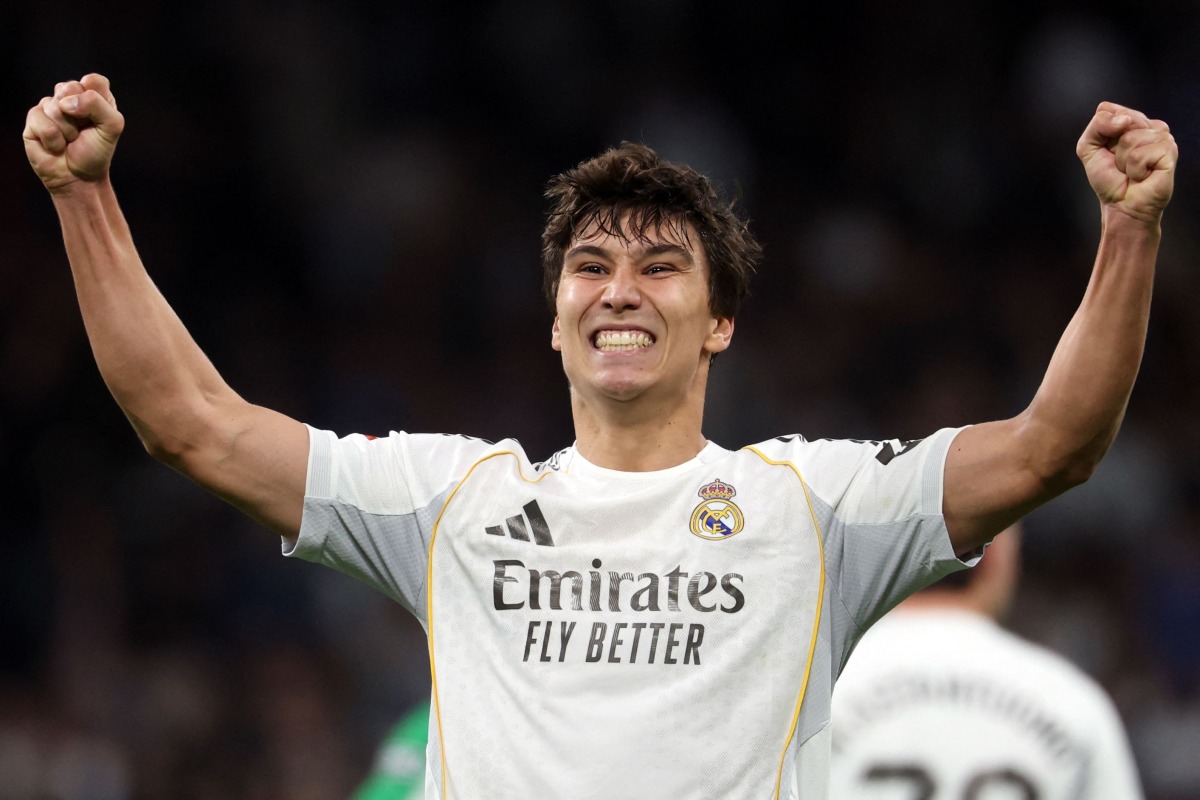 Real Madrid's Spanish forward #16 Gonzalo Garcia celebrates scoring his team's fourth goal during the Spanish League football match between Real Madrid CF and Real Betis at Santiago Bernabeu Stadium in Madrid on January 4, 2026. (Photo by Pierre-Philippe MARCOU / AFP)
