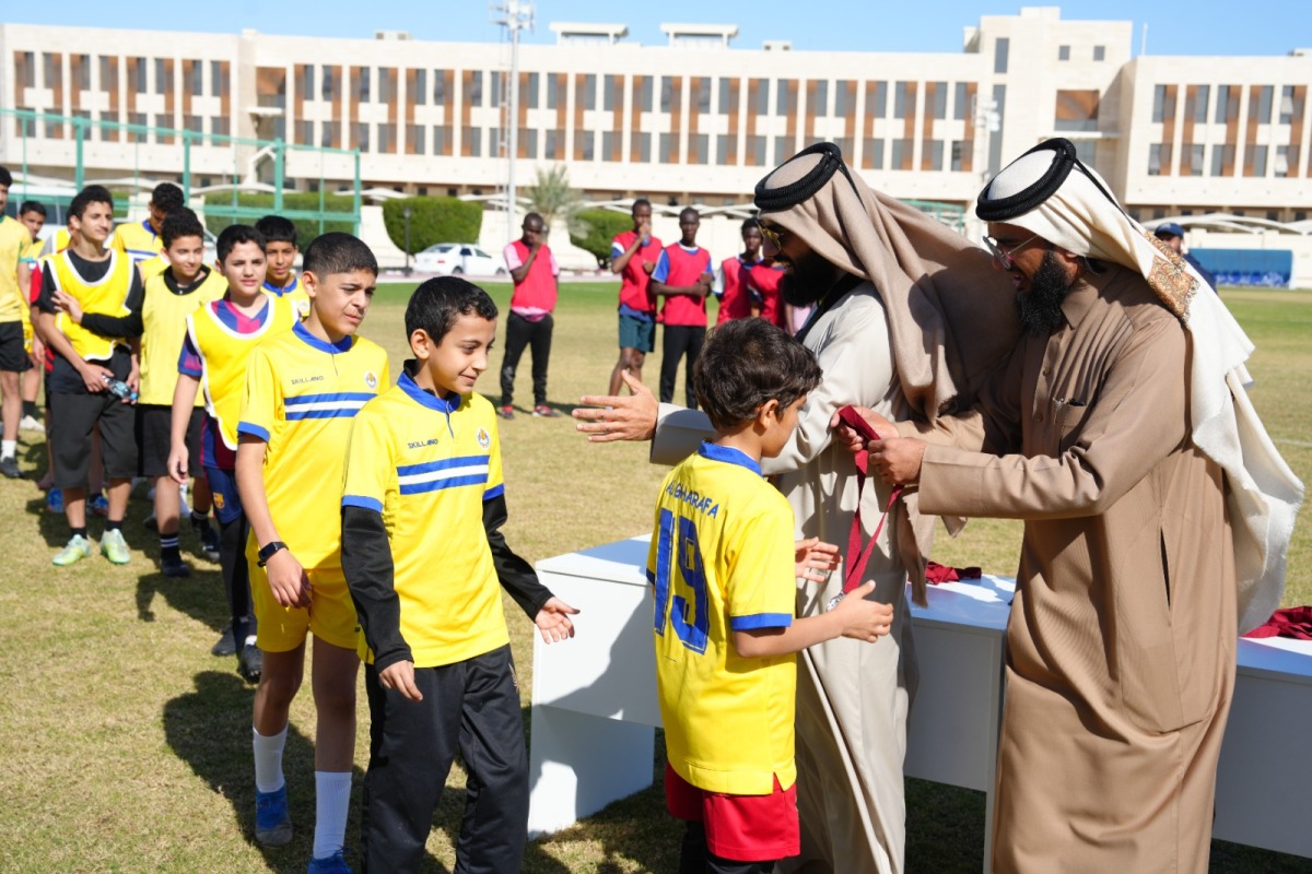 The winning team receiving medals during the closing ceremony.