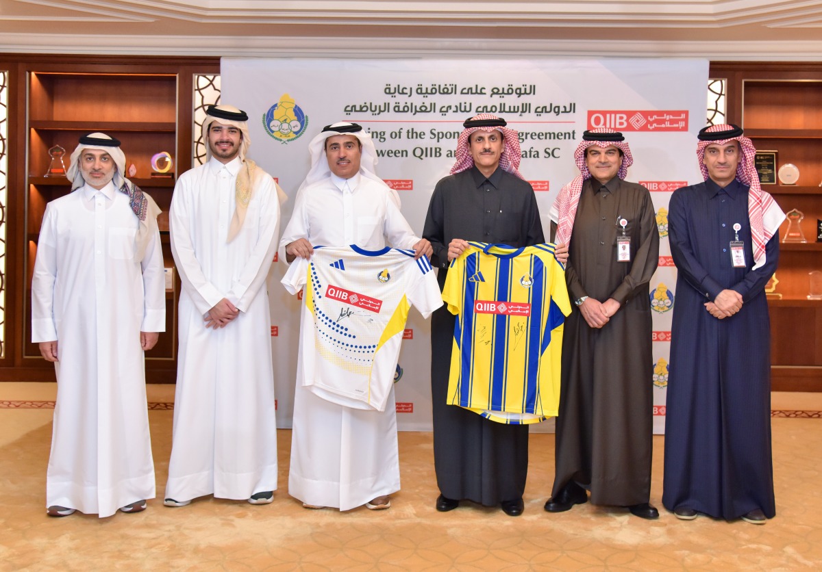 QIIB Chairman Sheikh Dr. Khalid bin Thani bin Abdulla Al-Thani, Al-Gharafa SC Club President Sheikh Jassim bin Thamer Al-Thani and other officials during the signing ceremony.