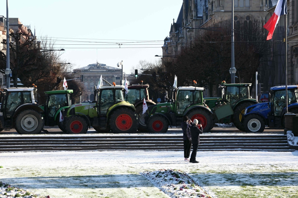 Members of farmers unions FDSEA and JA take part in a rally to defend their profession against the EU-Mercosur deal and the nationalisation of the Common Agricultural Policy (CAP - PAC Politique Agricole Commune) in Strasbourg, eastern France on January 7, 2026. (Photo by Frederick FLORIN / AFP)