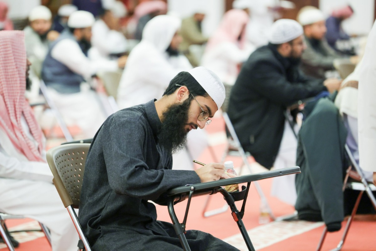 Participants during their written test for muezzins.