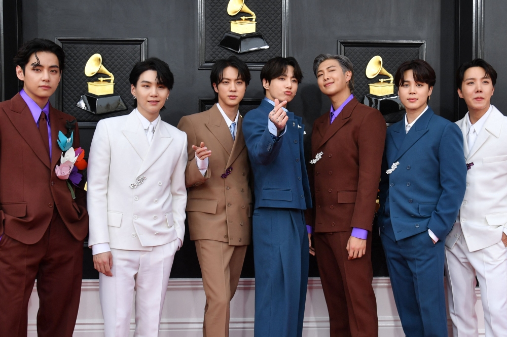 (Files) South Korean boy band BTS arrives for the 64th Annual Grammy Awards at the MGM Grand Garden Arena in Las Vegas on April 3, 2022. (Photo by Angela Weiss / AFP)
 