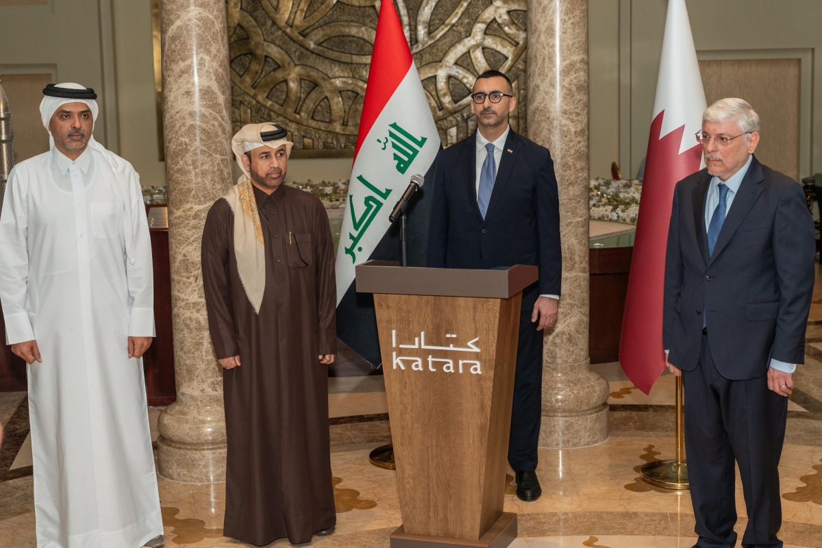 Director General of the Katara Cultural Village Foundation Professor Dr. Khalid bin Ibrahim Al-Sulaiti (second left), Ambassador of Iraq H E Mohammed Jaafar Al-Sadr (right) and other dignitaries during the cultural tasting event.