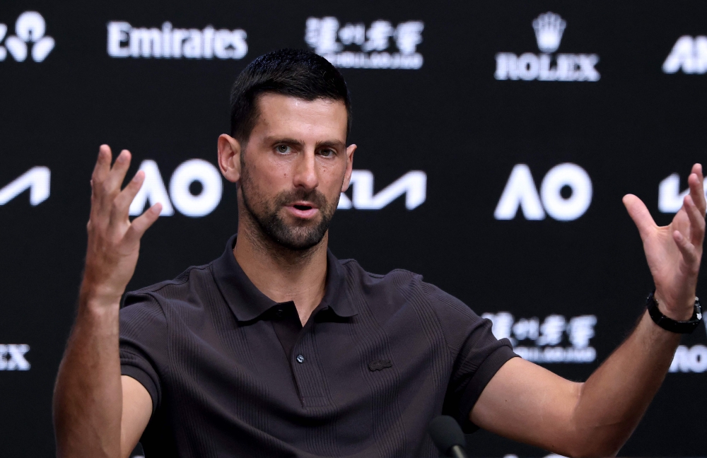 Serbia's Novak djokovic speaks at a press conference ahead of the 2026 Australian Open tennis tournament in Melbourne on January 17, 2026. (Photo by David Gray / AFP)