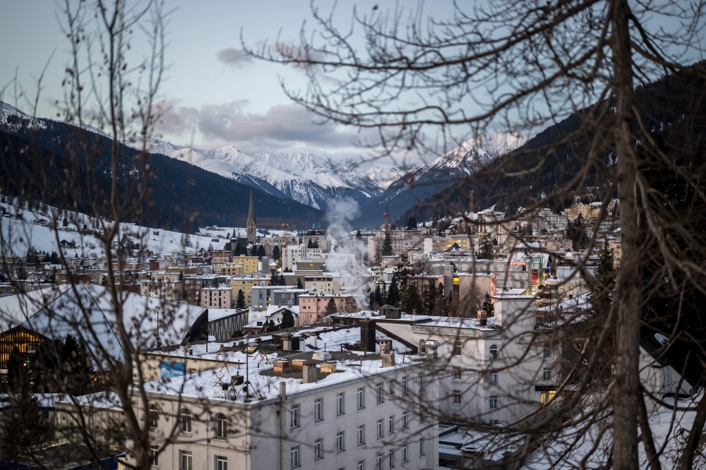 A photograph taken on January 19, 2026 shows a general view of the Alpine resort of Davos on the opening day of the World Economic Forum (WEF) annual meeting. (Photo by Fabrice Coffrini / AFP)
