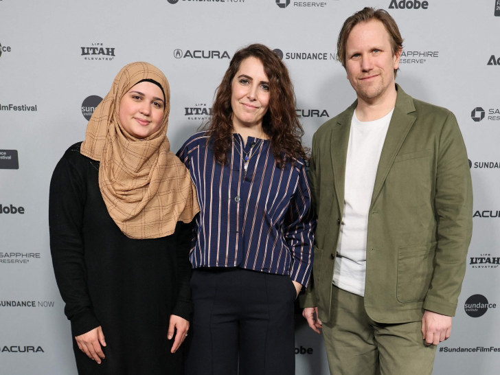 (L-R)  Isra'a, Itab Azzam and Jack MacInnes attend the 