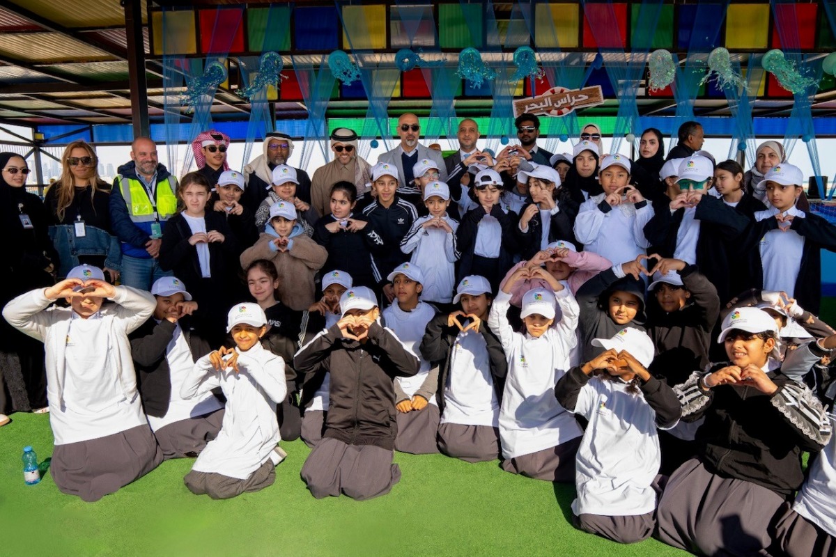 Assistant Undersecretary for Public Services Affairs Abdullah Ahmed Al-Karani with other officials and students during the event.