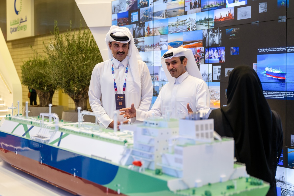 Amir H H Sheikh Tamim bin Hamad Al Thani being briefed by Minister of State for Energy Affairs, President and CEO of QatarEnergy H E Saad Sherida Al-Kaabi during the LNG2026 conference, yesterday.