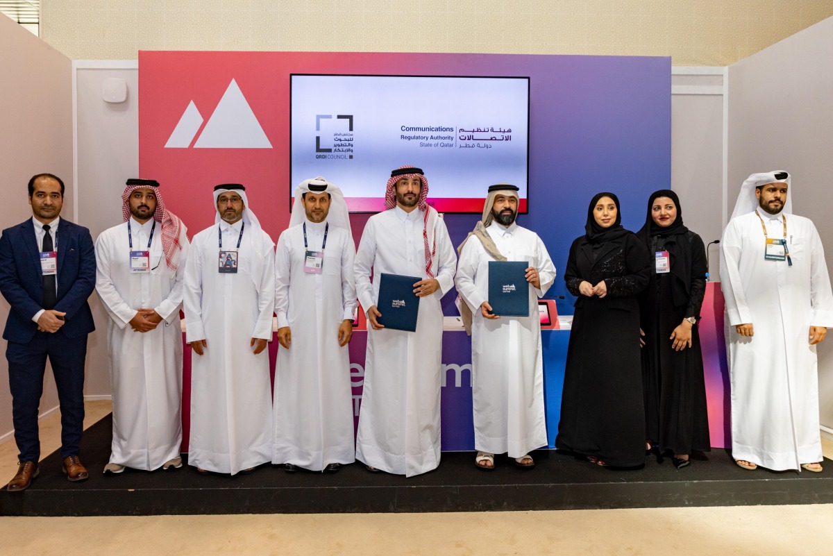 CRA President Eng. Ahmad bin Abdulla AlMuslemani (centre), Secretary General of QRDI Council Eng. Omar Ali Al Ansari (fourth right) and other officials at the signing event.