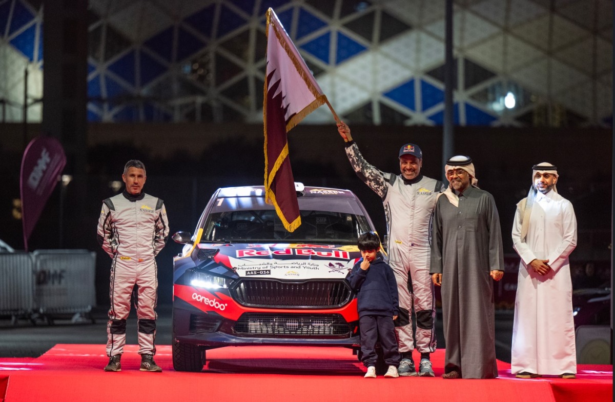 QMMF President Abdulrahman Al Mannai and Executive Director Amro Al Hamad with Nasser Saleh Al Attiyah and Candido Carrera during the ceremonial start. 