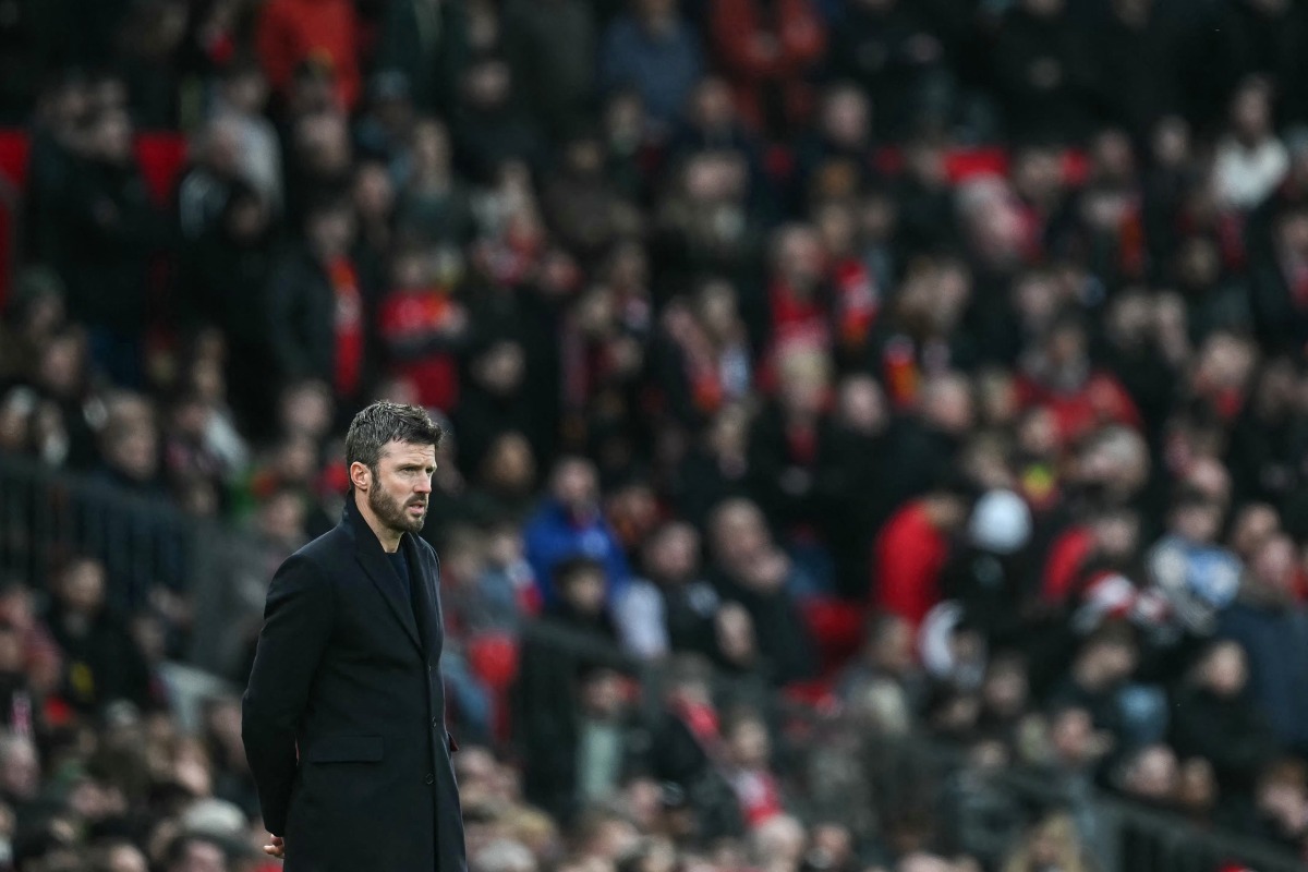 Manchester United's English interim head coach Michael Carrick looks on during the English Premier League football match between Manchester United and Fulham at Old Trafford in Manchester, north west England, on February 1, 2026. (Photo by Paul ELLIS / AFP)