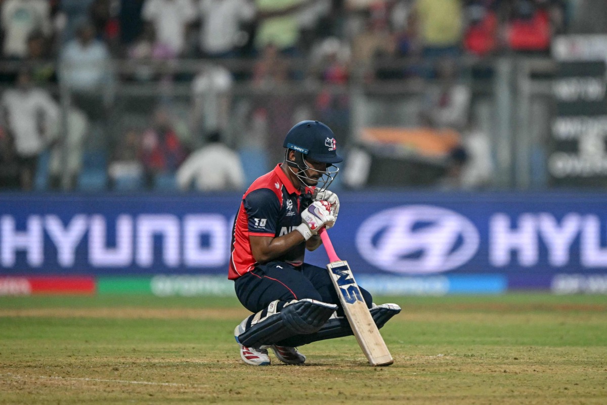 Nepal's Lokesh Bam reacts after his team's defeat at the end of the 2026 ICC Men's T20 Cricket World Cup group stage match between England and Nepal at the Wankhede Stadium in Mumbai on February 8, 2026. (Photo by Indranil MUKHERJEE / AFP)