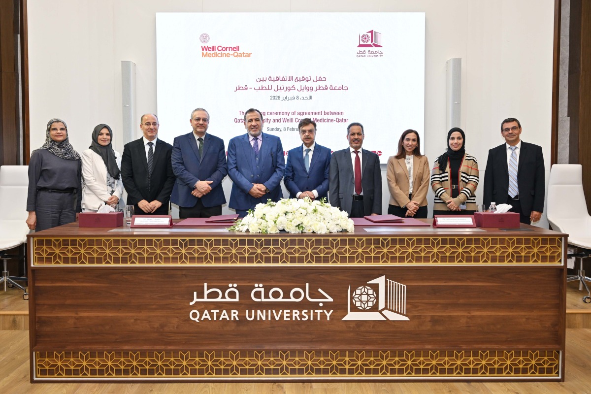 QU and WCM–Q officials during the signing of the agreement.