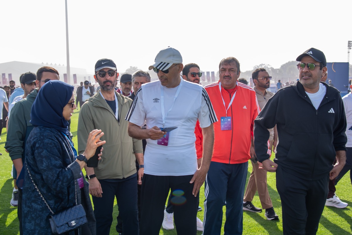 Speaker of the Shura Council H E Hassan bin Abdullah Al Ghanim with other officials during the National Sport Day event.