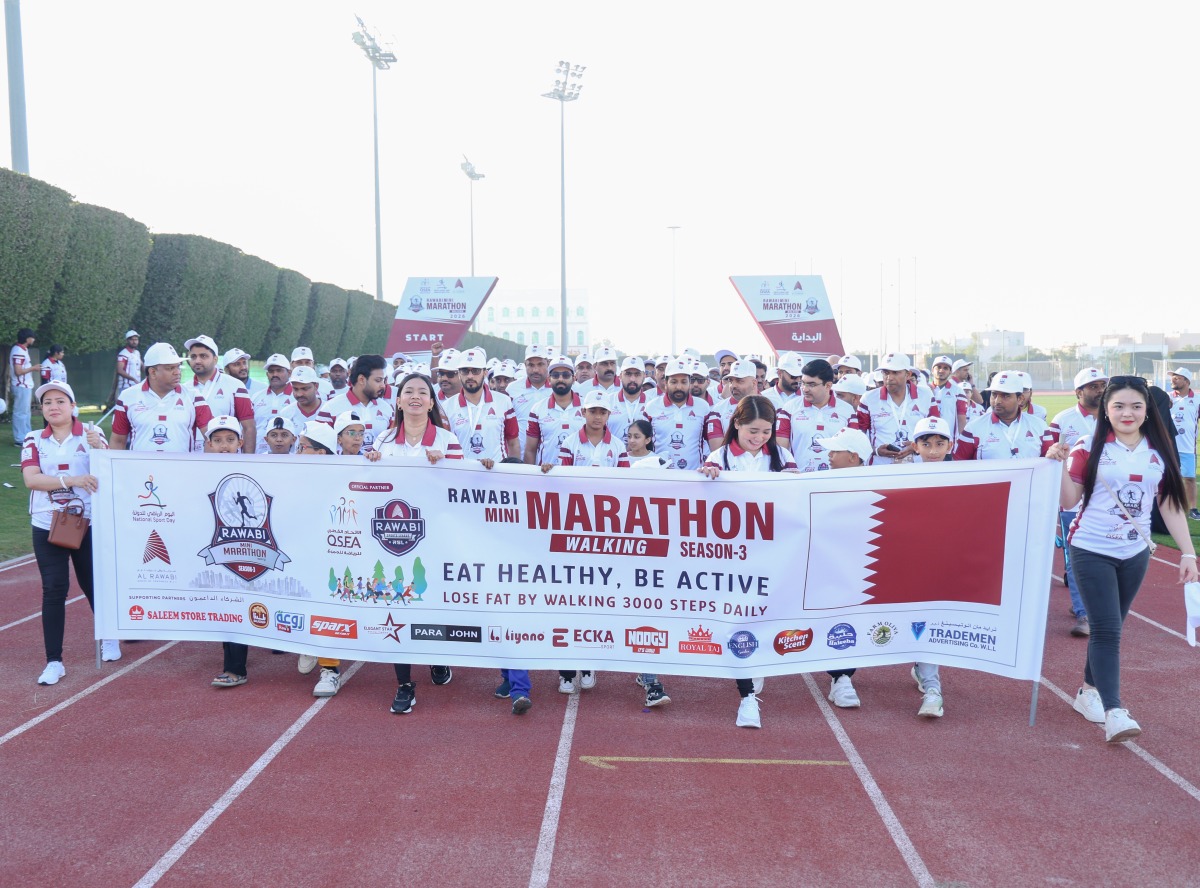 Rawabi officials, staff members and participants at the marathon.