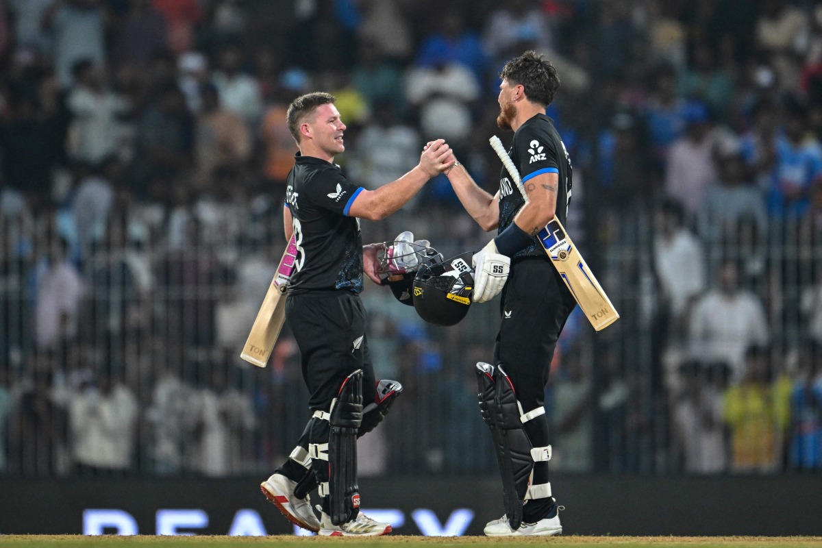 New Zealand’s Finn Allen (right) and Tim Seifert celebrate their victory.