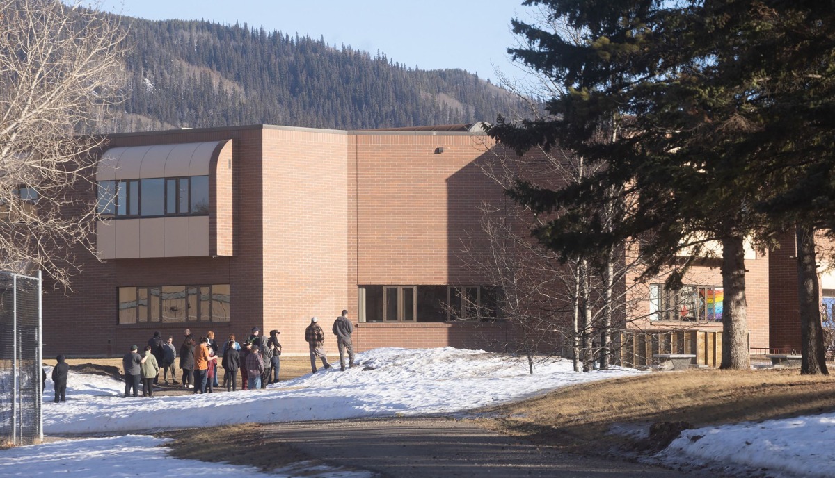This photograph provided by local journalist Trent Ernst shows the middle school and high school building where a shooting took place, leaving at least nine people dead in the small town of Tumbler Ridge, British Columbia, on February 10, 2026. (Photo by Trent Ernst / AFP)