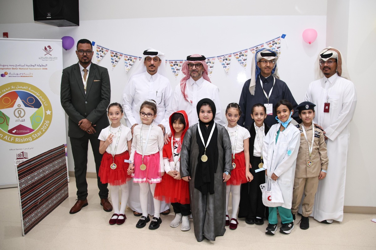 Officials with students during the field visit to the Destination Imagination programme to observe the challenges and student experiences,